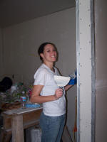 Worker with drywall